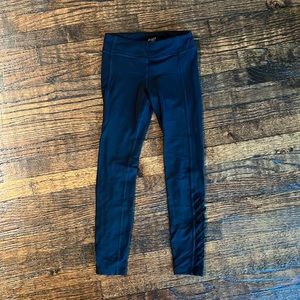 EUC Athleta Girl size 12 black leggings with detail on legs